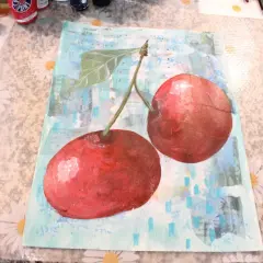 A vibrant collage and painting features two juicy cherries against a background of sheet music and abstract blue strokes.