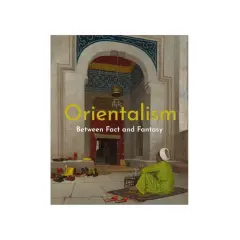 A man in a green robe sits on a rug in an ornate archway, a scene evoking orientalism art. Shoes are neatly arranged on the stone floor.