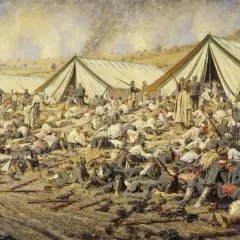 A battlefield scene by Vasily Vereshchagin depicts rows of tents and countless fallen soldiers, some wounded, others deceased, amidst scattered weapons and smoke rising in the distance.