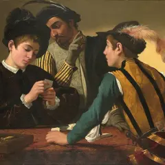 In the fortune teller painting, a young man plays cards while another peeks at his hand. A third man, with a sly expression, gestures to the viewer.
