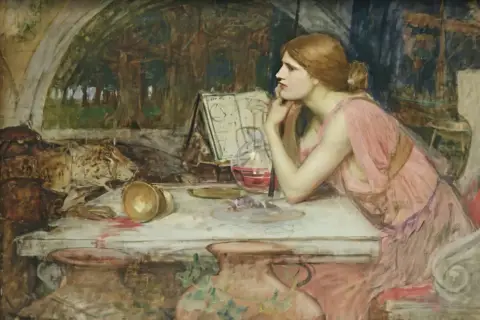 A pensive woman in a pink dress, likely Circe, gazes into the distance in this painting. She rests her chin on her hands, surrounded by alchemical tools and a mysterious red liquid.