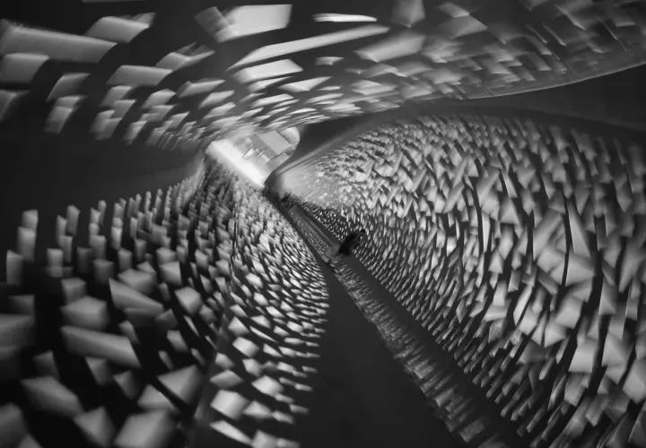 Abstract tunnel with light patterns. This is photography in art, capturing motion and form in a dynamic, dreamlike way.