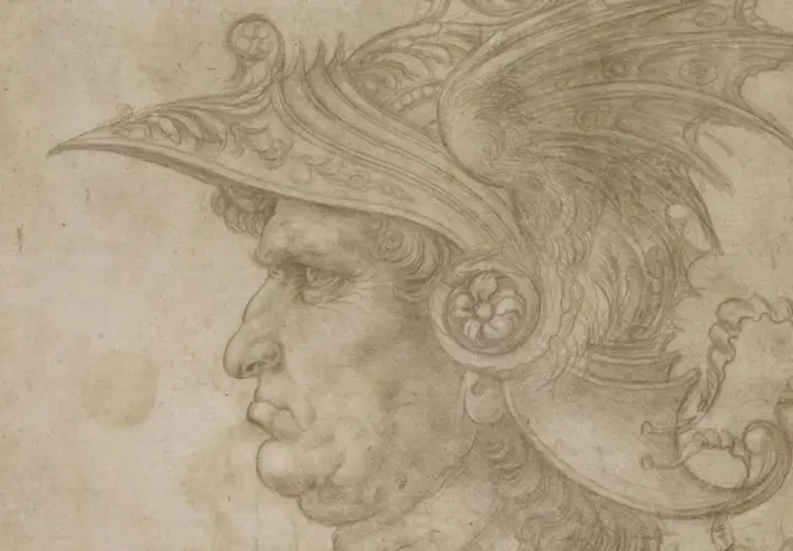 Profile of a man in a detailed helmet, rendered with delicate silver point lines. The drawing captures the warrior's stern expression and the ornate design of his headwear.