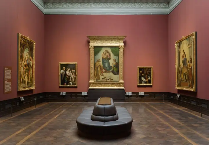 A museum gallery with the Raphael Sistine Madonna as the centerpiece, surrounded by other Renaissance paintings.