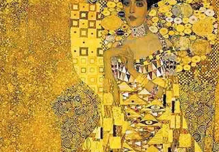 Gustav Klimt's portrait of Adele Bloch-Bauer I, a dazzling gold-leaf masterpiece, captures her regal presence amidst a mosaic of patterns.