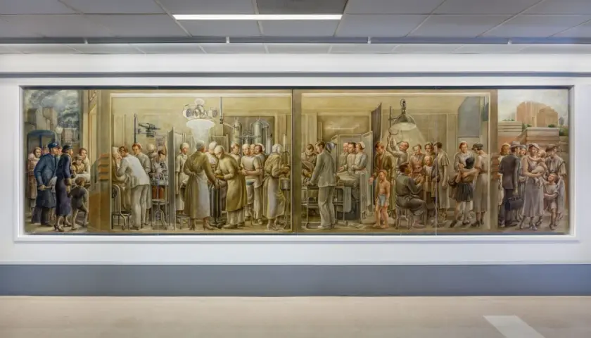 A mural depicting scenes of medical care, showcasing doctors and nurses tending to patients, a testament to famous medical paintings and the history of healing.