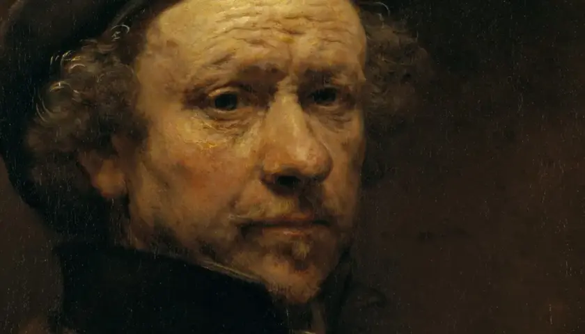 A close-up of a Rembrandt self-portrait, showing the artist's weathered face and intense gaze.