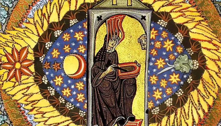Vivid Hildegard of Bingen art depicts a woman in a dark robe, writing in a book, surrounded by celestial bodies and fiery sun rays.