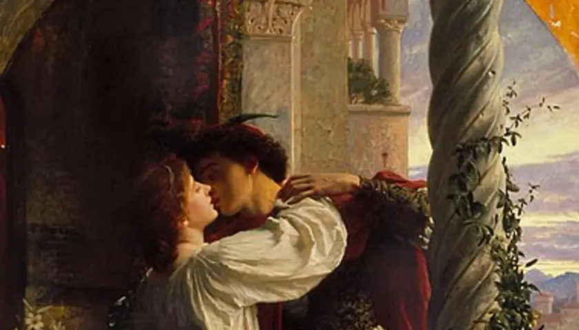 Romeo and Juliet share a passionate kiss on the balcony, bathed in the soft glow of sunset.