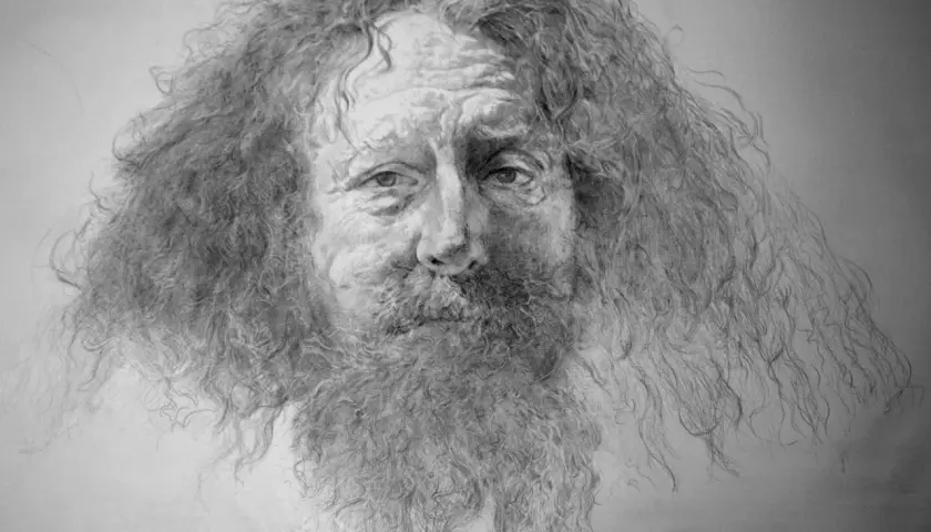 A detailed silver drawing captures the weathered face and wild, flowing hair of an old man, his eyes holding a story.
