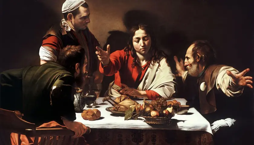Caravaggio's Supper at Emmaus: Jesus blesses a meal with disciples, one gesturing in surprise.
