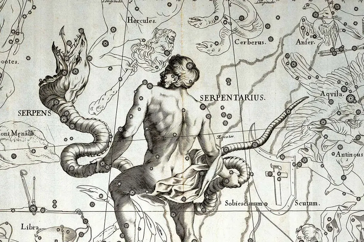An antique celestial map depicts Serpentarius wrestling a serpent, surrounded by other medieval zodiac signs like Hercules and Aquila.