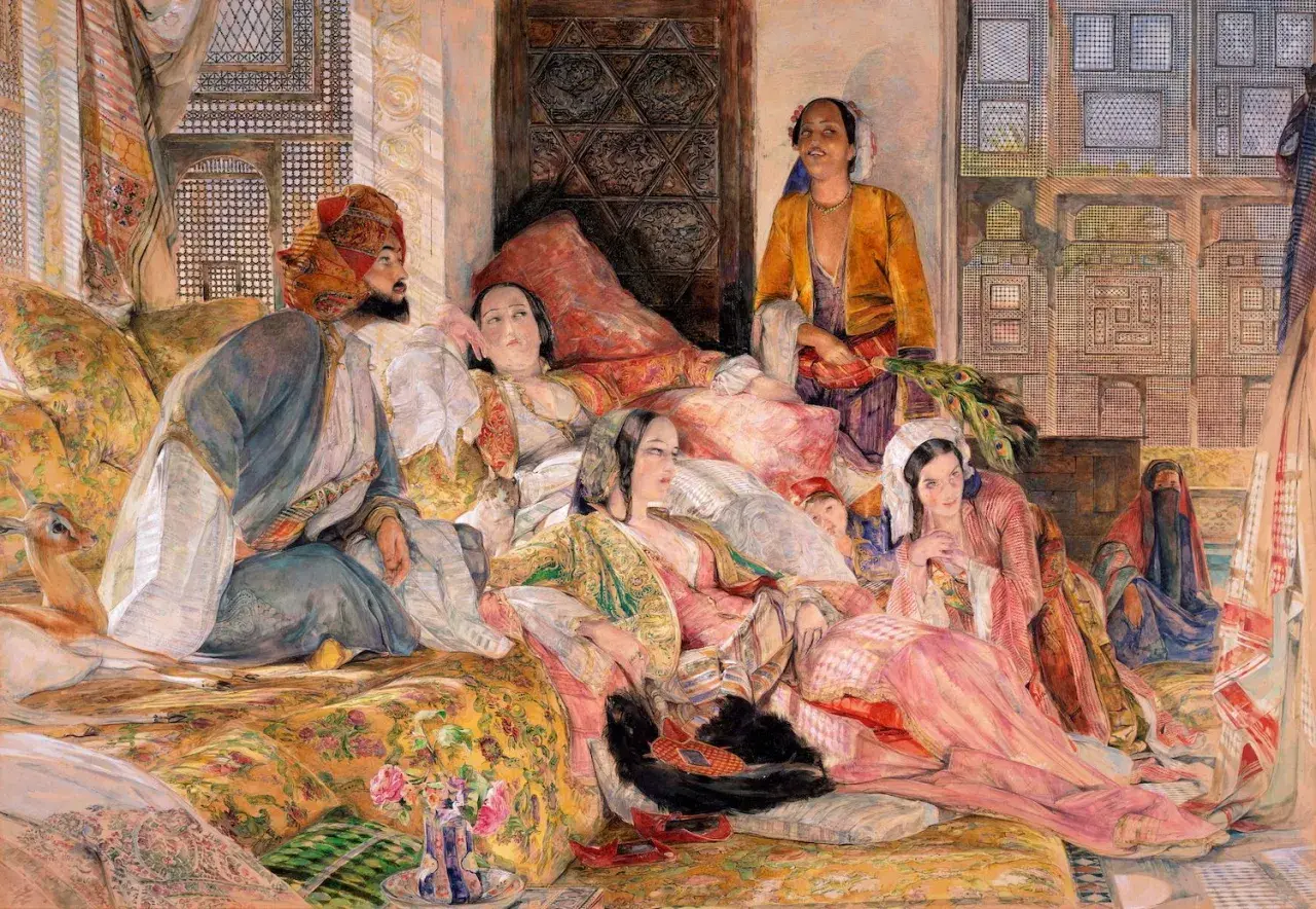 A history painting depicting a man in a turban and several women in opulent attire lounging on cushions, with a gazelle nearby.