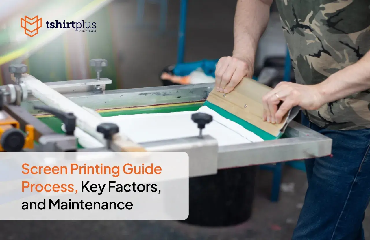 A person demonstrates how to screenprint, using a squeegee to apply ink on a screen. This image is part of a guide on the screen printing process.