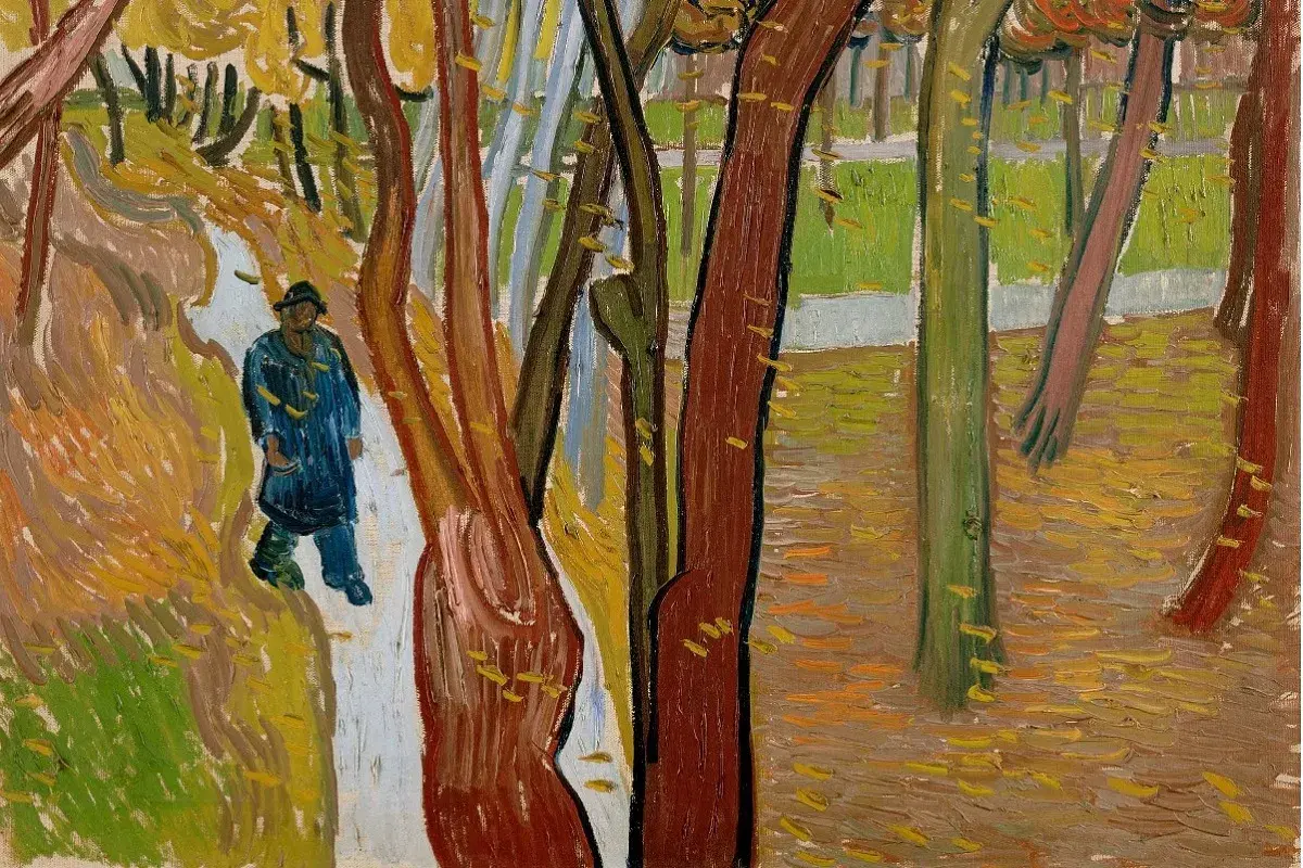 A solitary figure in a blue coat walks a path through a forest, a scene reminiscent of famous autumn paintings, with vibrant fall colors and scattered leaves.