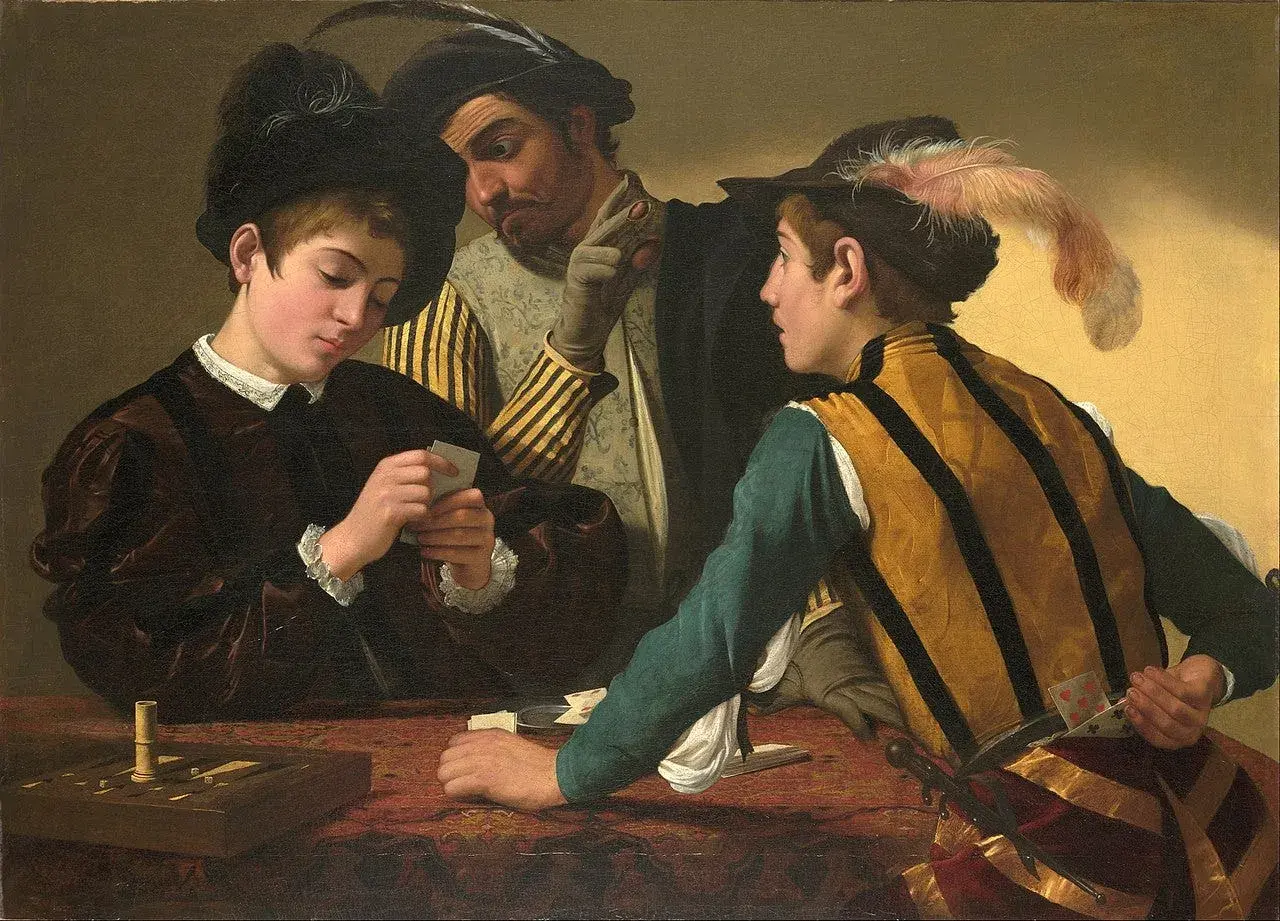 In the fortune teller painting, a young man plays cards while another peeks at his hand. A third man, with a sly expression, gestures to the viewer.