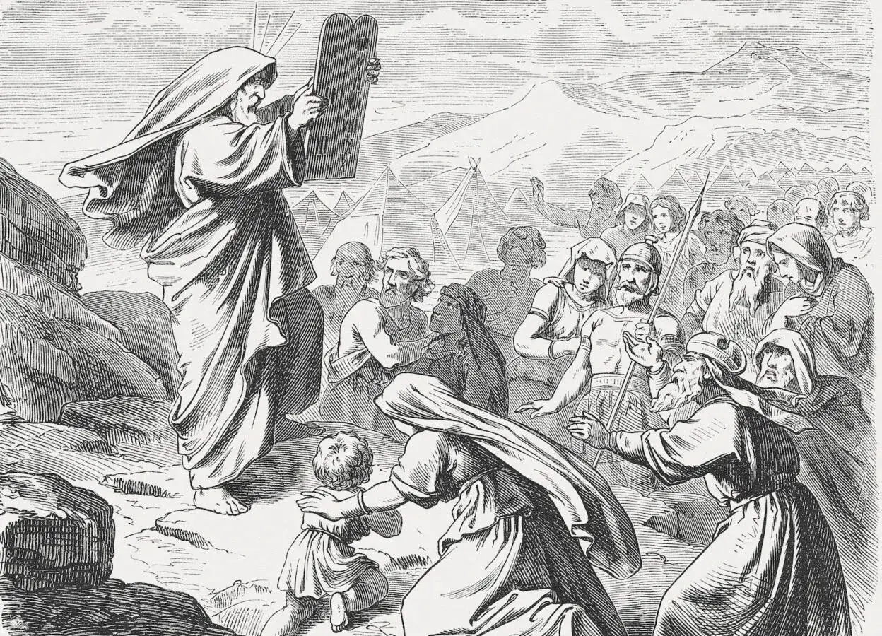 Moses on Mount Sinai painting shows Moses holding the Ten Commandments tablets to a crowd of people.