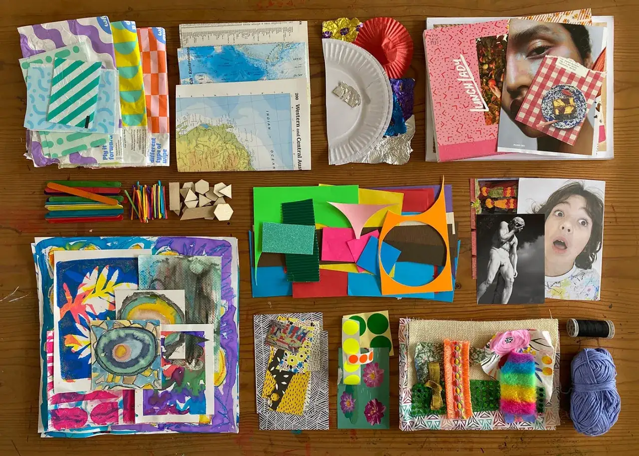 A vibrant art collage is taking shape with colorful papers, maps, and found objects. This art collage is a playful exploration of textures and images.